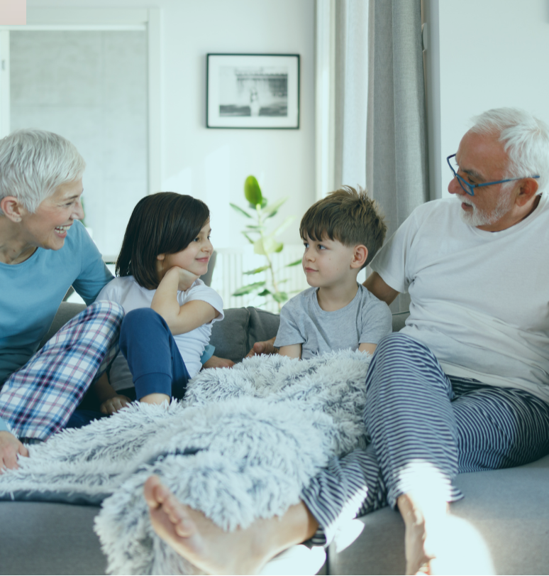 Family reviewing documents at a kitchen table